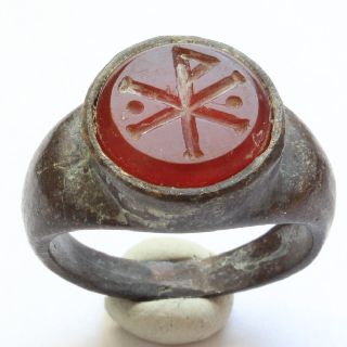 Roman Ring With Red Carnelian Engraved The Chi Rho Symbol Bronze Ring photo