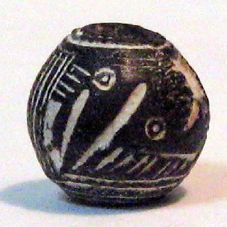 Pre - Columbian Black Birdlooking Down Spindle Whorl Guaranteed. Authentic photo