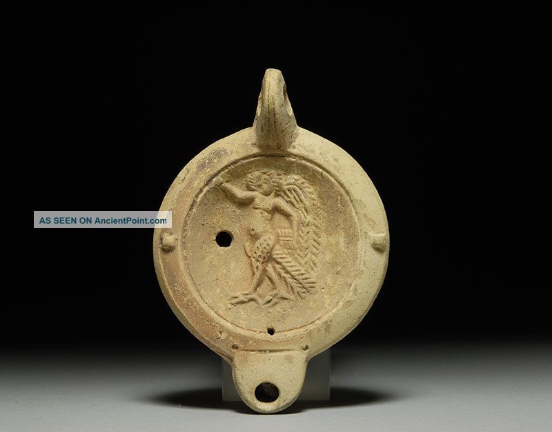 Ancient Roman Tunisian Oil Lamp Of A Siren 150 A. D . Roman photo