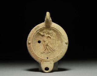 Ancient Roman Tunisian Oil Lamp Of A Siren 150 A. D . photo