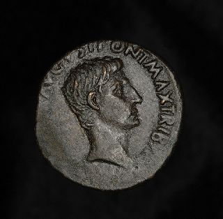 Ancient Roman As Coin Of Emperor Augustus Octavian photo