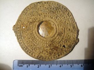 Roman Lead Mirror With Decorations And Whole Paste In The Middle photo