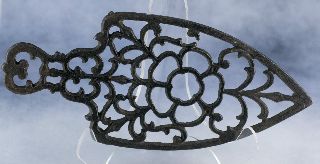 Vintage Antique Lacy 3 Legged Cast Iron Spade Shaped Sad Iron Stand Trivet photo