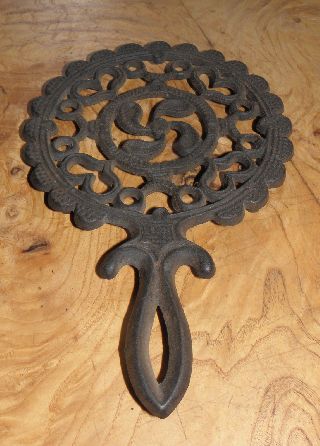 Vintage Trivet Maine Collection Cast Iron Footed Round Handlepin Wheel Hearts photo