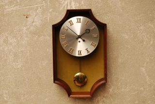 Howard Miller Pendulum Wall Clock Vintage Mid Century photo
