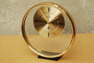 Kruger Floating Lucite Mantel Clock Brass Gold Lucite Round Mid Century Modern photo