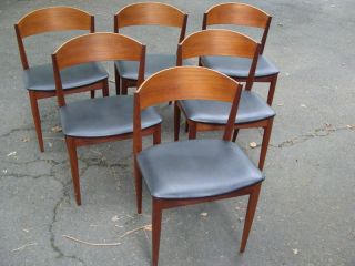 6 Danish Teak Curved Back Chairs (possible Frem Rojle photo