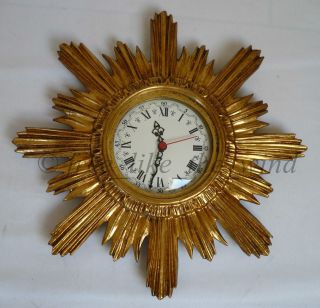 Vintage Sunburst Wall Clock Black Forrest Gilt Wood Starburst Germany Midcentury photo