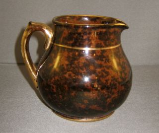 Antique English Cream Pitcher With Tortoise Shell And Lustre Glaze photo
