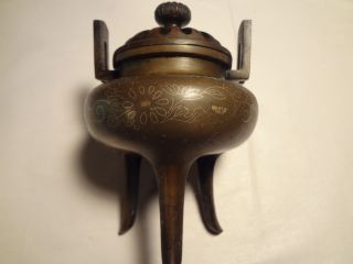Bronze Incense Burner With Brass Inlaid photo