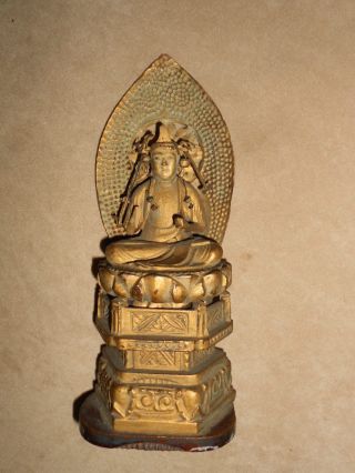 A Japanese Buddha Figure photo