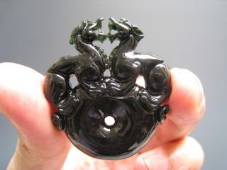 The Beautifully Carved Black Greenstone Ssangyong Pendant photo