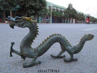 China Art Bronze Gilt Carved Fly Dragon Statue photo