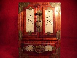 A Chinese Wood Table Cabinet With Jade Inserts photo