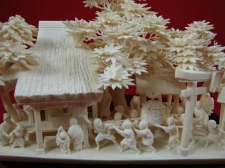 Hand Crafted Japanese Art Ox Bone Miniature Temple Scene photo