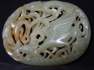 10.  A Chinese Green White Ressut Color Jade Probably Ming Dynasty photo