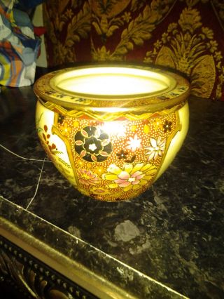 Gold Vase With Precious Designs photo