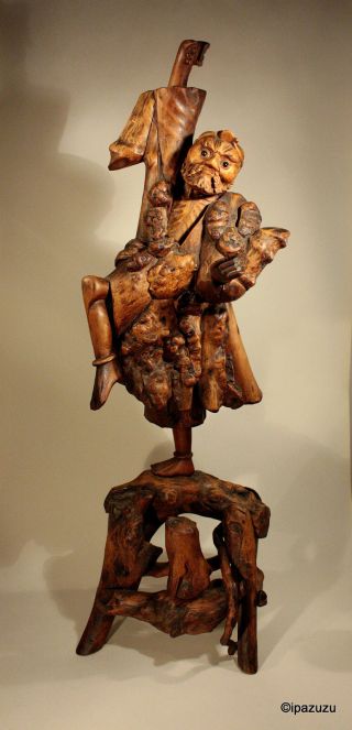 Chinese Rootwood Carving Emaciated Immortal With Mythical Beast photo