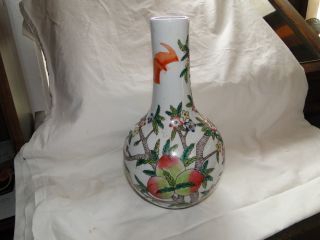 Old Chinese Vase With Bats And Peachs photo