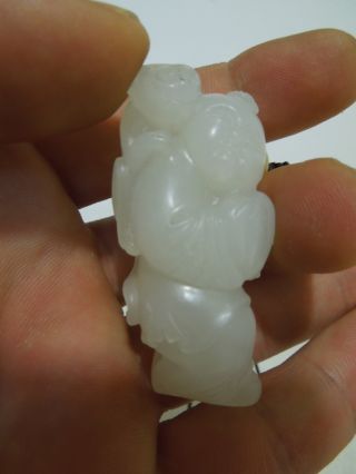 21.  A Chinese White Jade Carving Of A Boy & A Monkey Probably 20th To 21th C photo