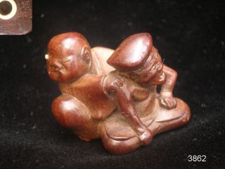 Late 18thcentury Edo Netsuke Of A Blind Masseur With Client Signed Mokusui At 61 photo