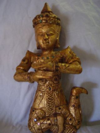 Hand Carved Gilded Statue Of Siam/thai Musician photo