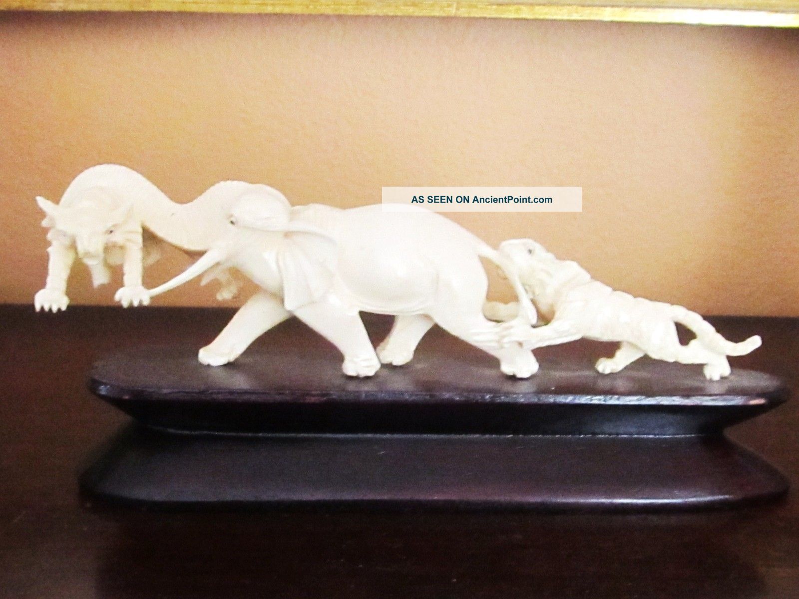 Ox Bone Elephant And Fighting Tiger Statuette Figurine Elephants photo