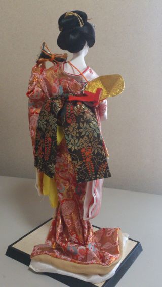 A Japanese Geisha Kimono Doll photo