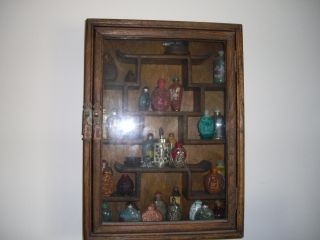 Chinese Curio Cabinet For Snuff Bottles photo