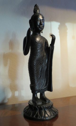 Bronze Statue Of Ceylon Standing Buddha From Sri Lanka photo