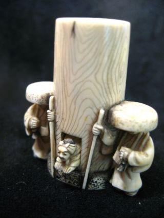 Japanese Carved Netsuke: Two Concubines? Guarding Tower photo
