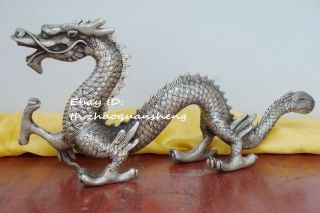 China Tibet - Silver Statue Dragons photo