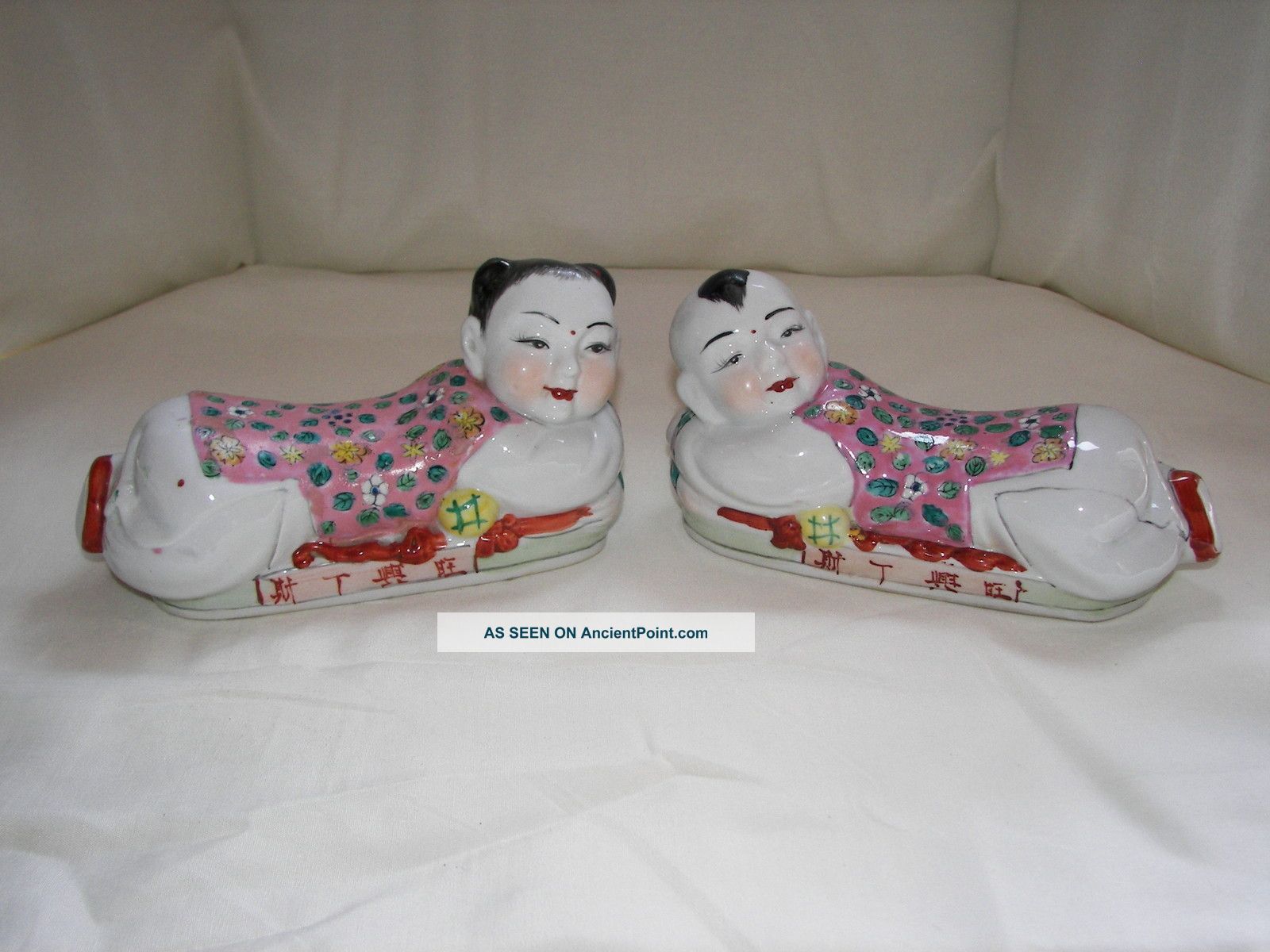 A Pair Of Vintage Famille Rose Children On Pillows Porcelain photo