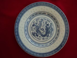 A Vintage White And Blue Porcelain Chinese Dish With A Lucky Dragon photo