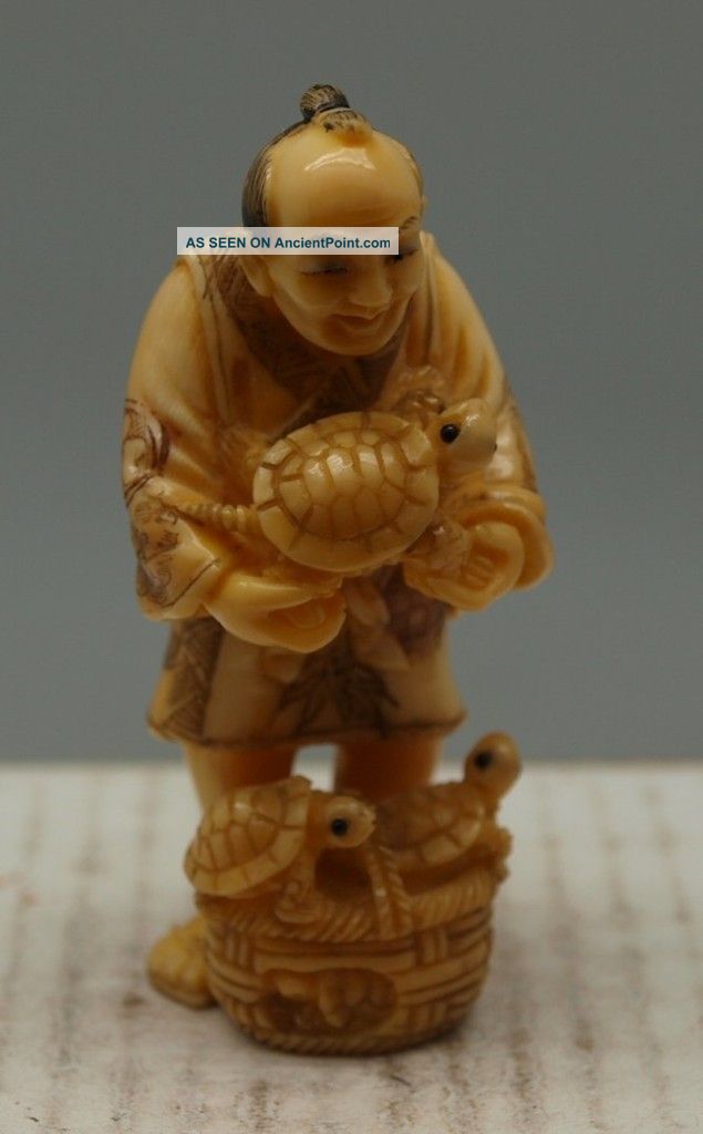 Hand Carved Japanese Man Netsuke - ' The Turtle Seller ' - Signed Netsuke photo