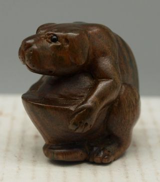 Oriental Hand Carved Wooden Netsuke - Dog With An Ingot - Mother Of Pearl photo