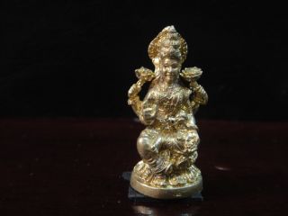 Lakshmi Goddess Of Love And Wealth Charm Amulet photo