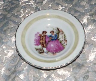 9.  5cm Diam.  Japanese Porcelain Miniature Plate In European Scene With Gilt Rim photo