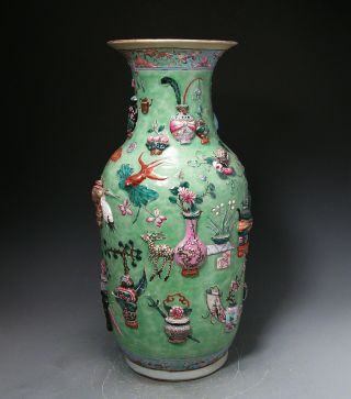 Unusual Large Antique Chinese Enameled Vase With Relief Designs And Objects photo