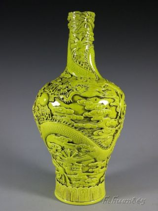 A Stunning Chinese Yellow Porcelain Carved Dragon Vase photo