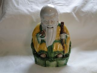 Old Chinese Figure Man With Staff photo