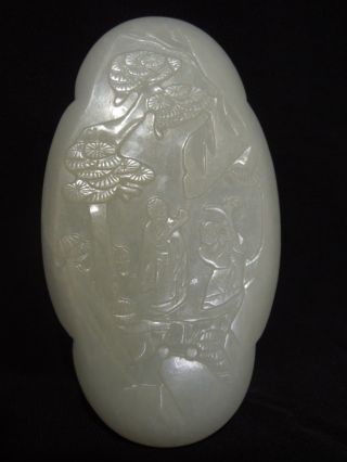 19.  A Chinese White Jade Plaque Carving Of Tree Mountain And Men Probably 18th C photo