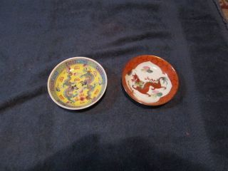 2 Chinese Flat Decorative Bowls - Red Dragon And A Green Dragon photo