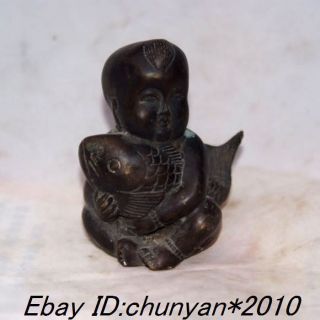 Chinese Small Bronze Lad And Hold Fish Fish photo