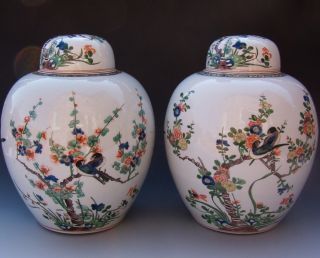 2 Chinese Qing Dynasty Famille Verte Bird Scenic Lidded Vases Christies photo