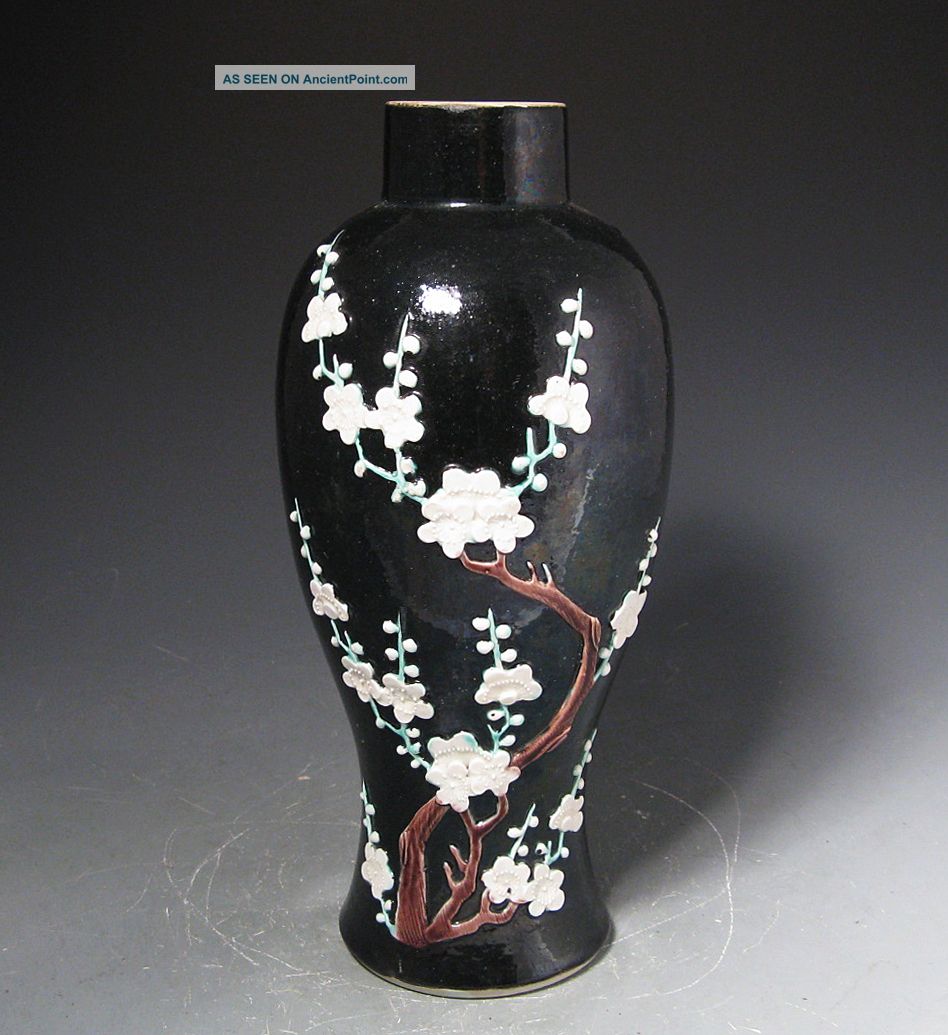 Antique Chinese Famille Noire Vase With Relief Prunus Blossoms Vases photo