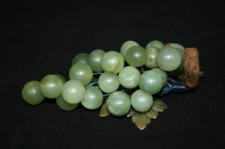 A Grapes Shape Jade With Leaves photo