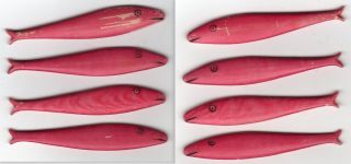 4 Red Oxe Bone Gaming Counters Fish Design Date Unknown.  (11) photo