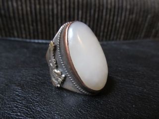 A Chinese Antique White Jade Ring Mounted On Silver photo