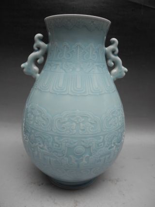 Chinese Monochrome Carved Porcelain Vase With Bubble photo